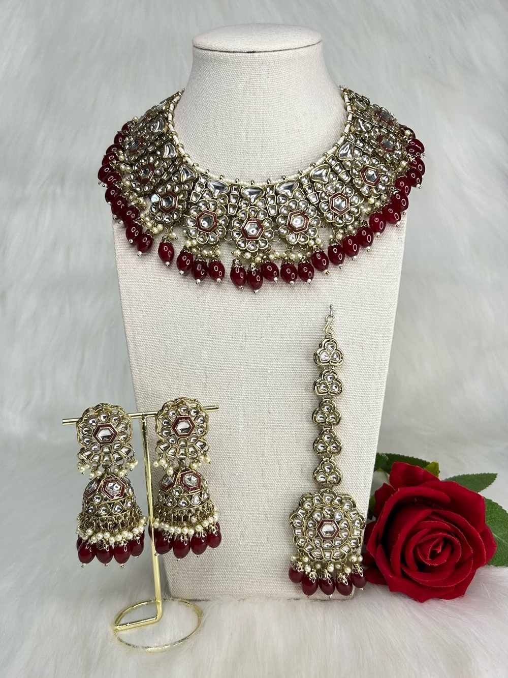 Beautiful Gold and Maroon Kundan Statement Necklace Set With Jhumka And Tikka